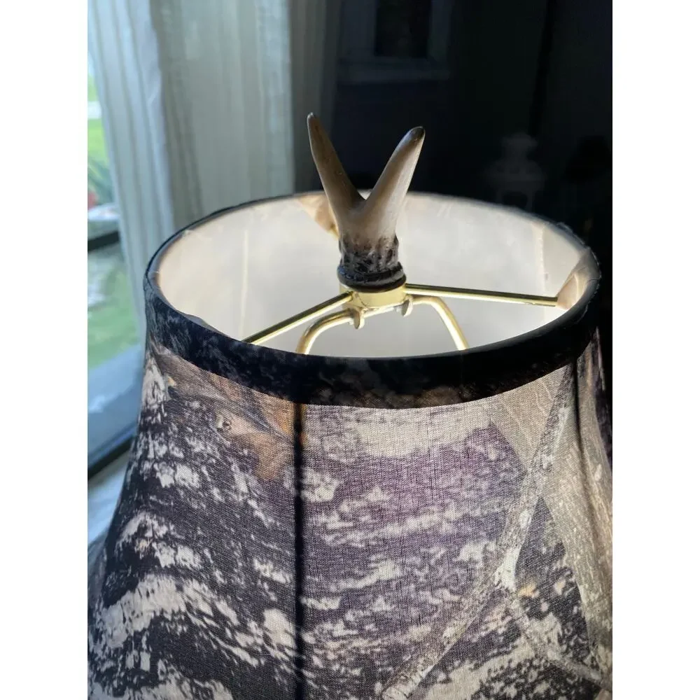 rustic table lamp featuring a base made of camo-patterned fabric lampshade